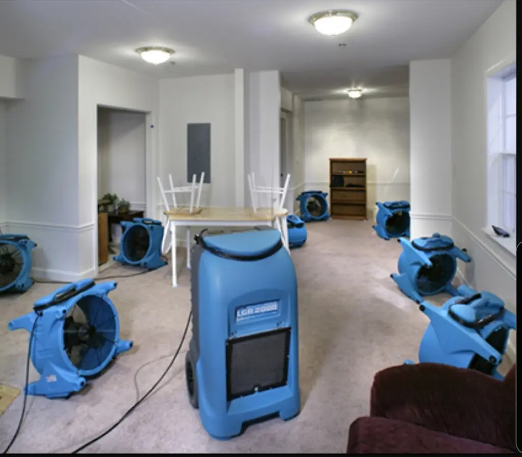 Air movers and dehumidifier setup for Water Damage Restoration in Chevy Chase